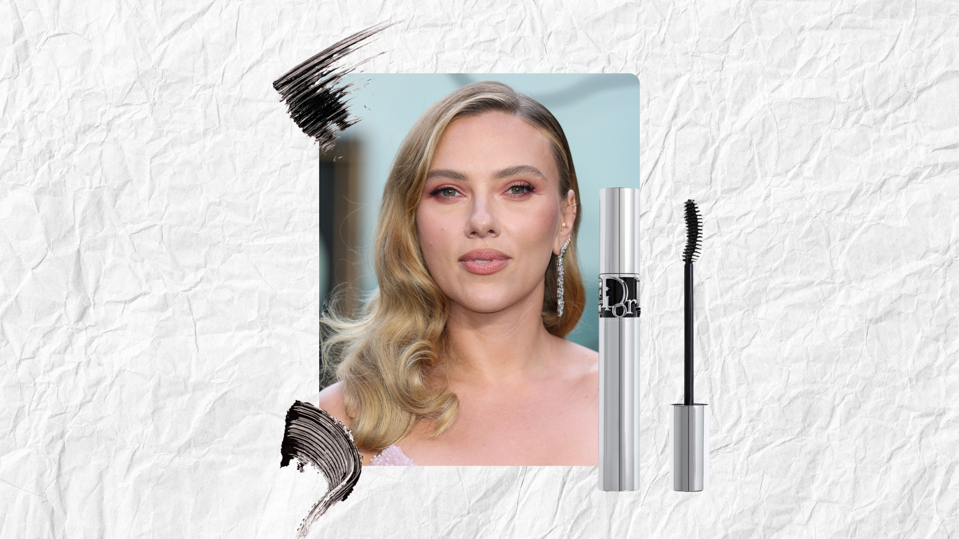 Image of Scarlett Johansson smiling with curled long blonde hair to one side and wearing a strapless gown, on a white textured background with Dior&#039;s Diorshow Iconic Overcurl Mascara and mascara swatches