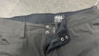 Close up of waistband of Mons Royale Virage pants