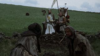 Screenshot of King Arthur and Patsy meeting Dennis from Monty Python and the Holy Grail