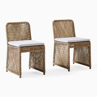 Two West Elm natural colored wicker dining chairs for the best furniture brands.