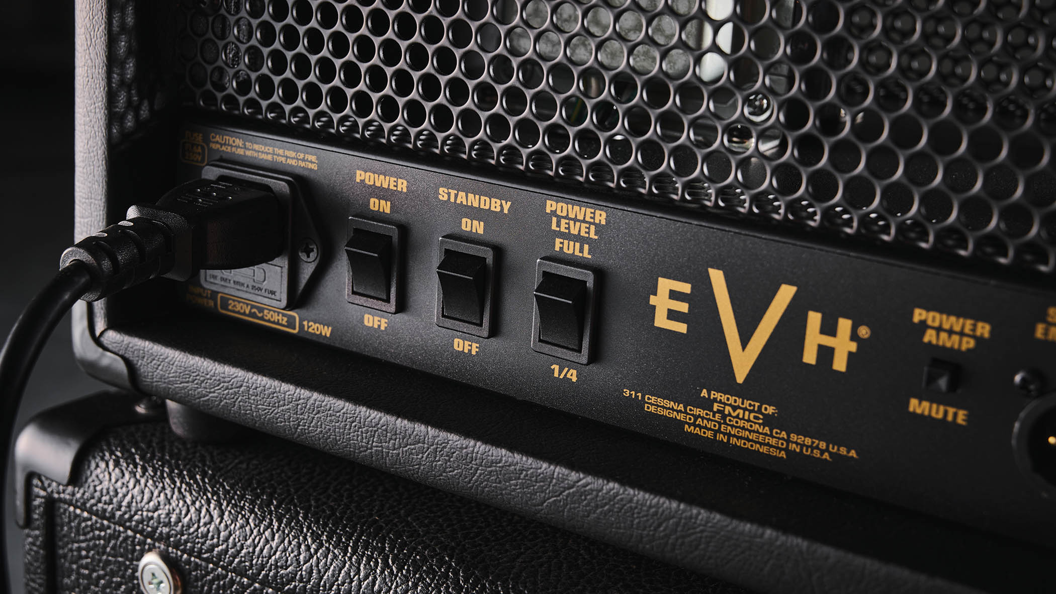 EVH 5150 Iconic Series 15-watt head: the black amp with gold control panel is photographed in close-up