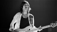 Bass player Tetsu Yamauchi from Faces performs live on stage at Lewisham Odeon in London on 21st November 1974