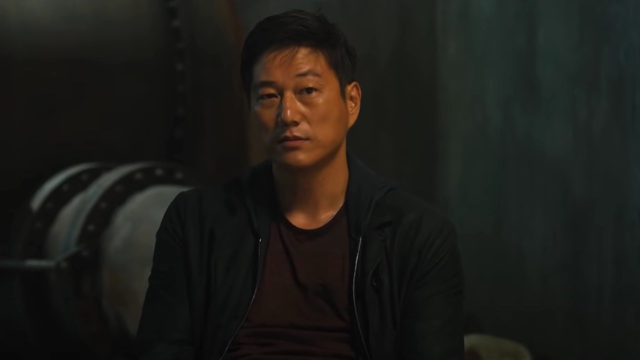Sung Kang looking ahead in conversation in F9