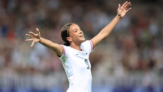 The US' Mallory Swanson, with hands out stretched, celebrates scoring her side's 2nd intention in opposition to Zambia in the Olympics soccer competition.