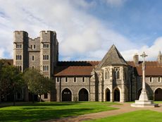 Fig 2: The Upper Quadrangle showing the porch to Great School (right) and gatehouse (left). Lancing College, West Sussex. ©Paul Highnam for Country Life