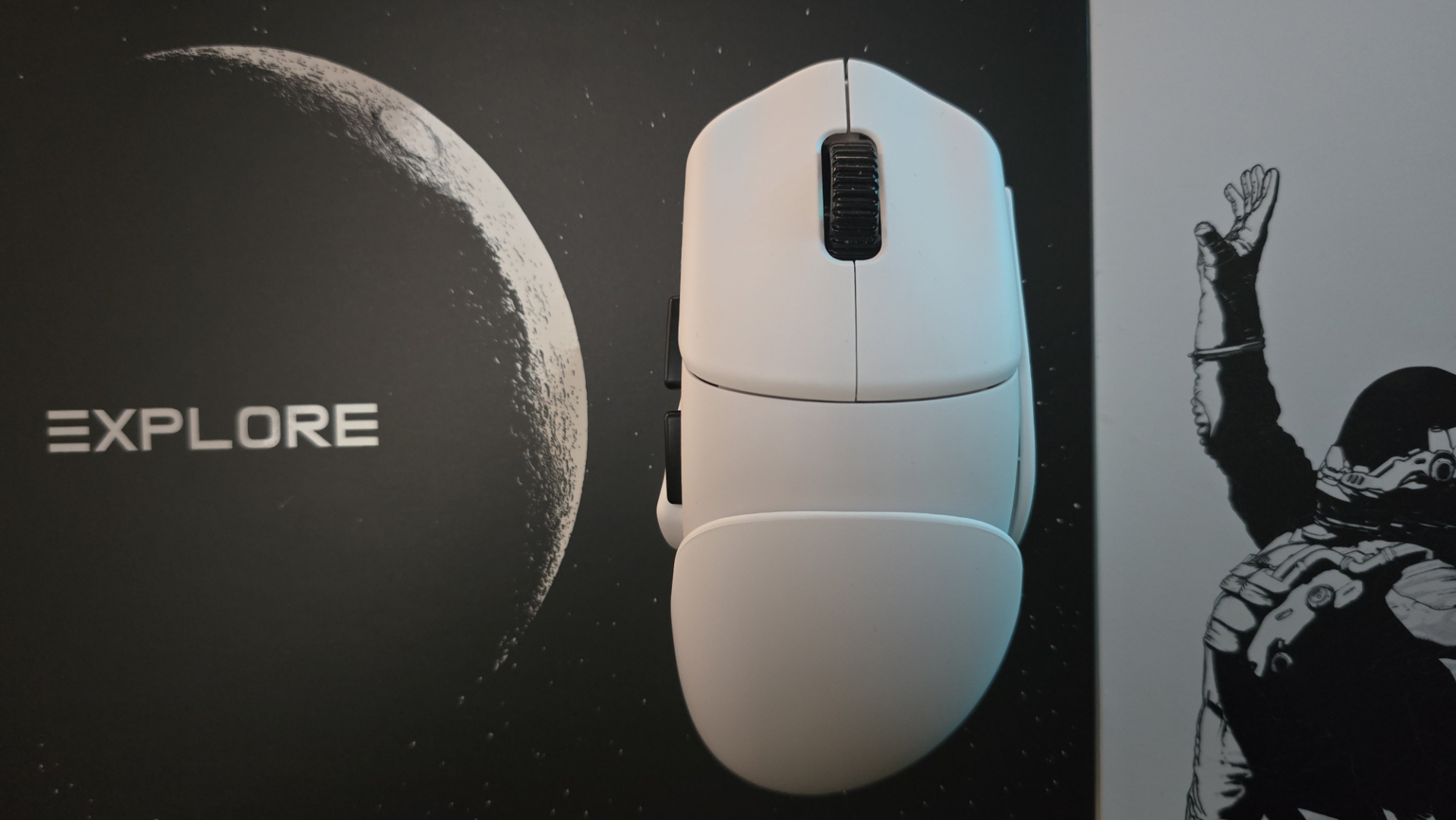 Orbital Pathfinder gaming mouse with various attachments.