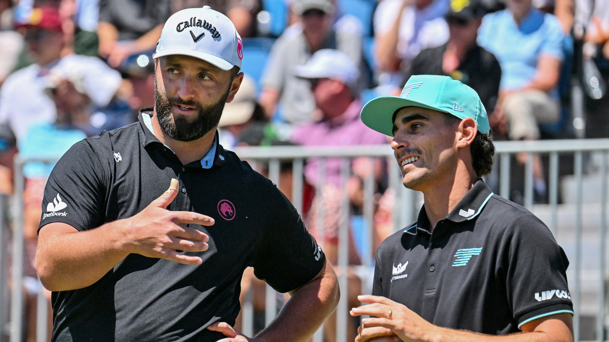 Jon Rahm and Joaquin Niemann chat during LIV Golf Adelaide 2025