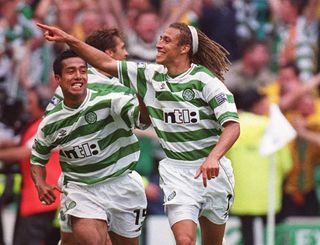 Henrik Larsson celebrates after scoring for Celtic against Rangers, August 2000