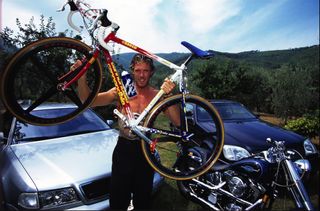MARIO CIPOLLINI WITH A SELECTION OF HIS BIKES AND CARS IN 1999
