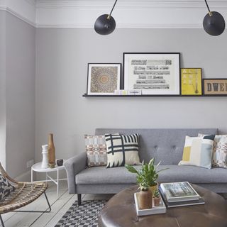 small grey living room with picture rail