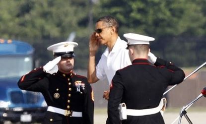 President Obama salutes as he returns from Camp David: The president is expected to unveil a secret plan to significantly reduce U.S. forces in Afghanistan.