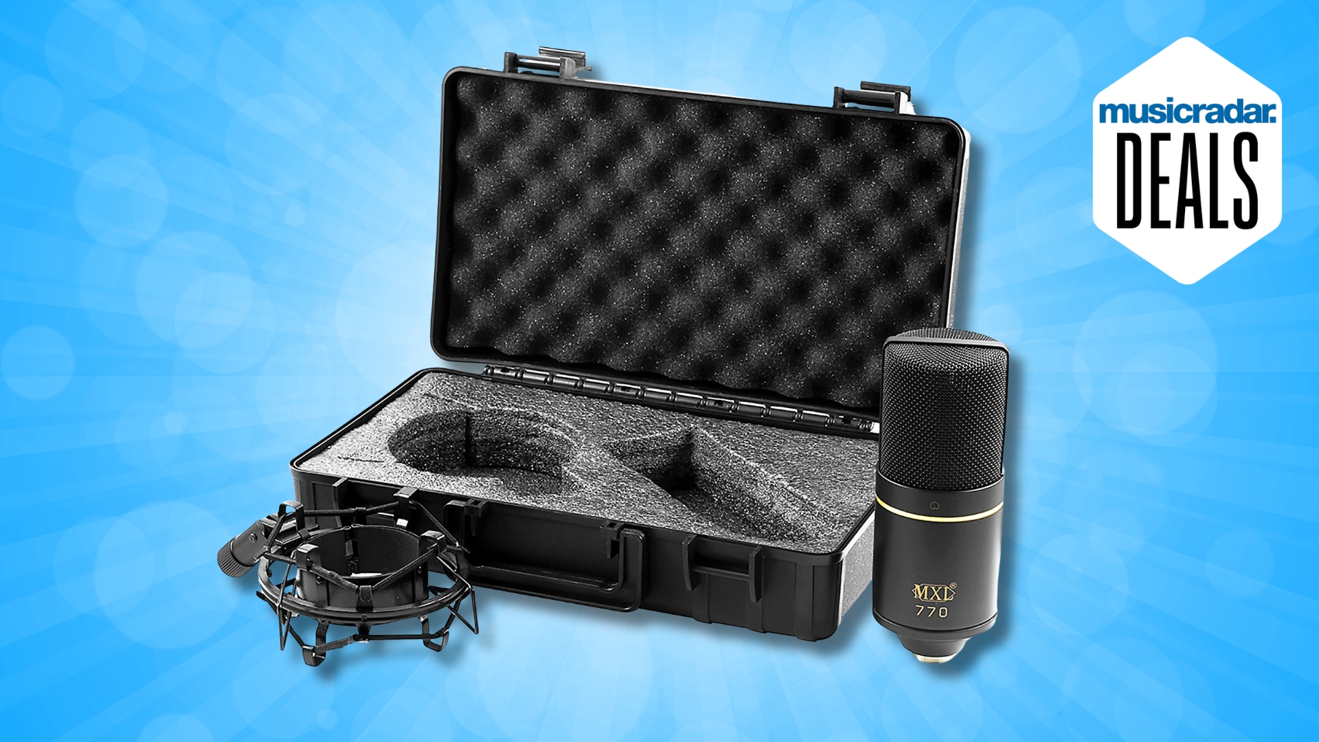 An MXL condenser microphone with carry case and shock mount on a blue background