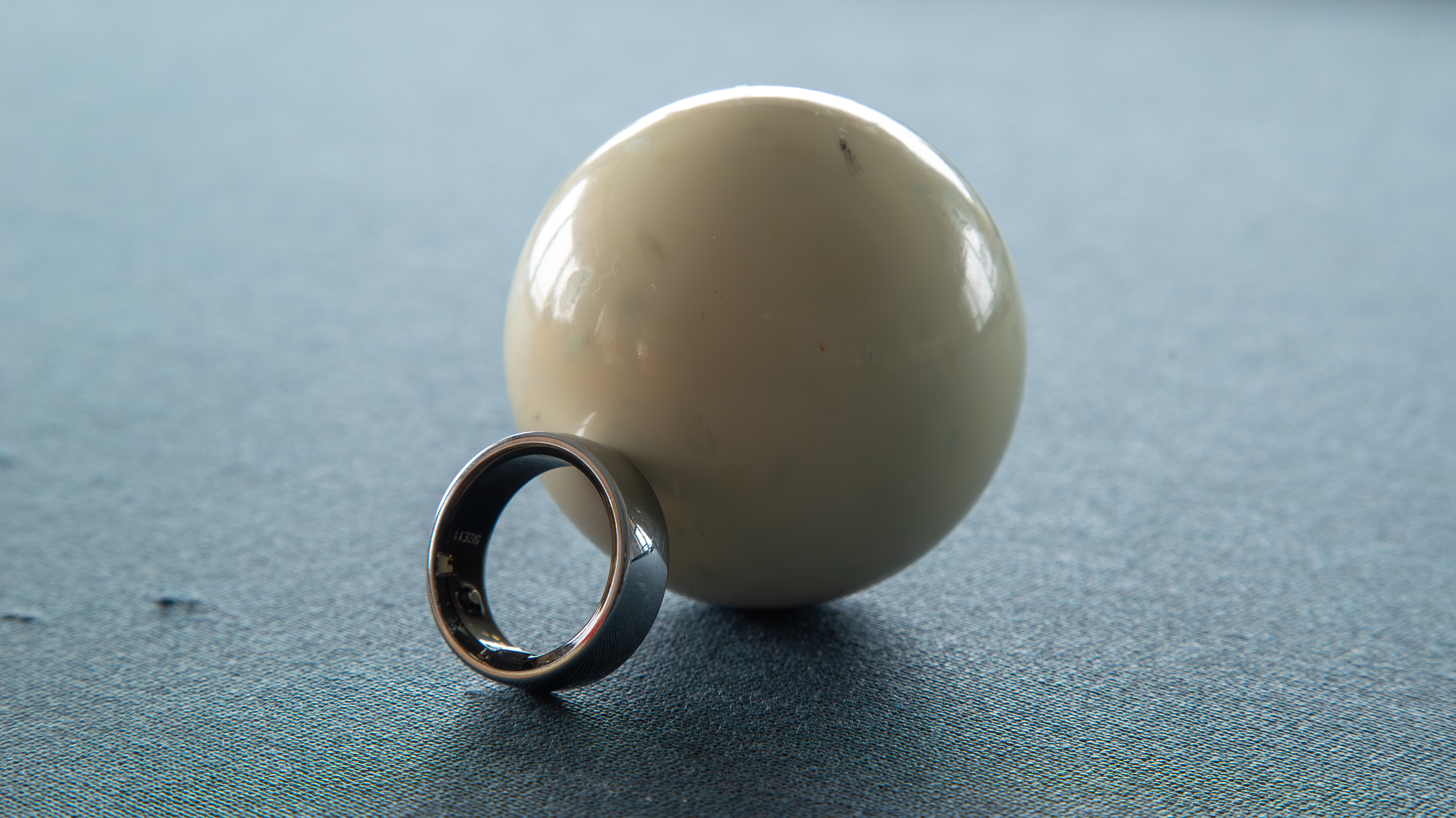 Circular Ring 2 next to a billiard ball