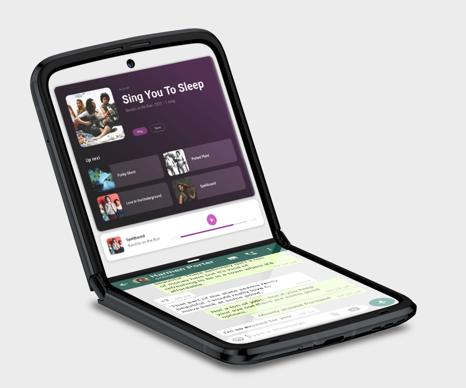 The Motorola Razr 2022 sitting half-open with WhatsApp on the bottom and a media player on the top half