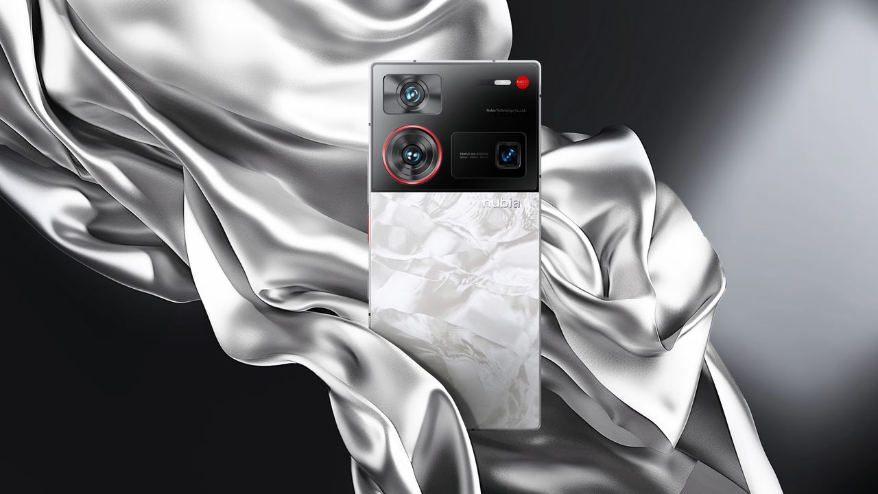 The Nubia Z60 Leading Version in white and draped in a satin cloth