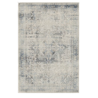 A distressed blue patterned rug