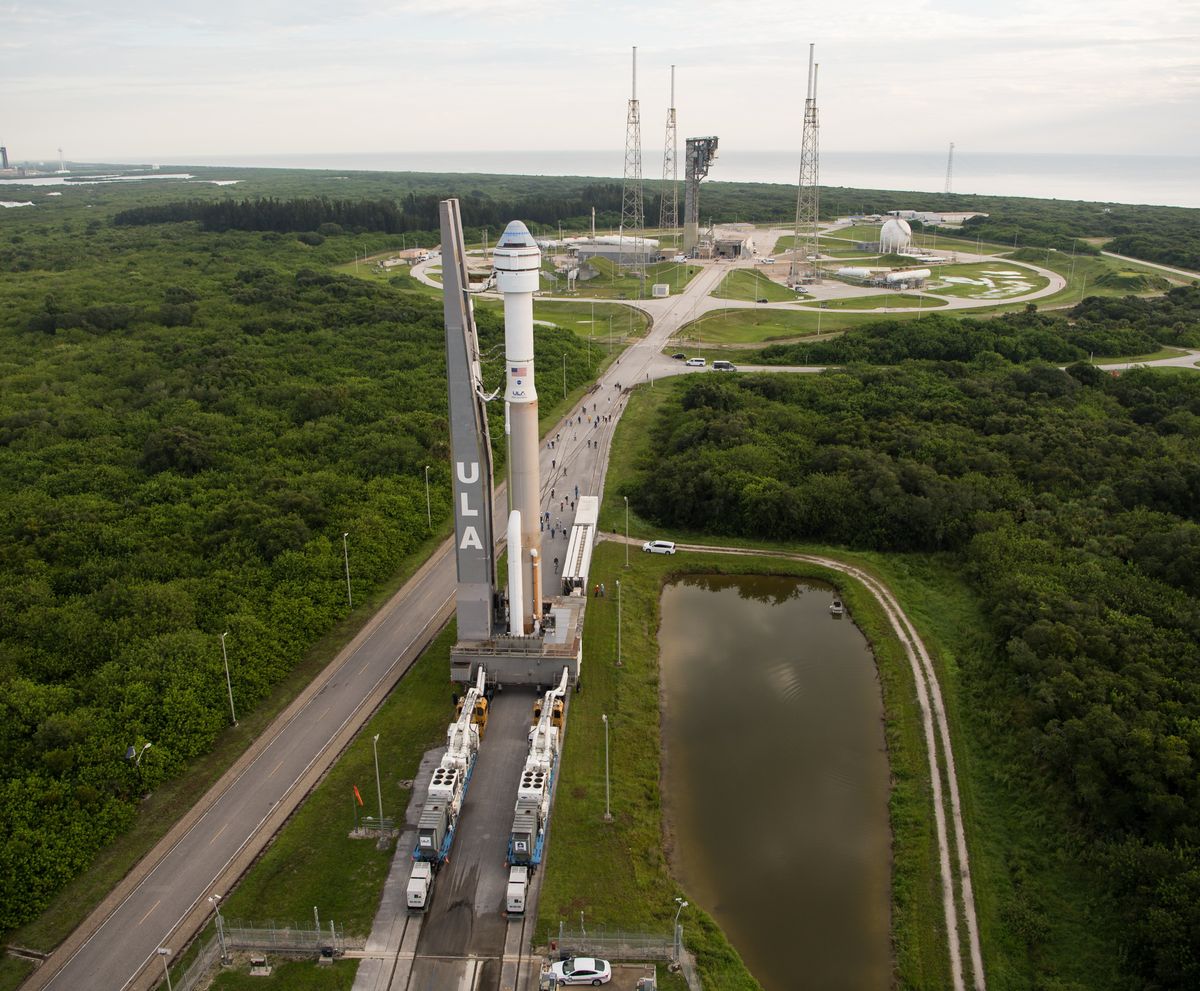 Boeing&#039;s Starliner capsule and its United Launch Alliance Atlas V rocket roll out to their launch pad at Cape Canaveral Space Force Station on Aug. 2, 2021.