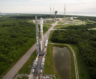 Boeing's Starliner capsule and its United Launch Alliance Atlas V rocket roll out to their launch pad at Cape Canaveral Space Force Station on Aug. 2, 2021 ahead of a planned Aug. 3 launch. That liftoff did not happen; teams needed more time to investigate a possible issue with valves in Starliner's propulsion system.