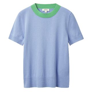 Light blue knitted t-shirt with green contrast collar