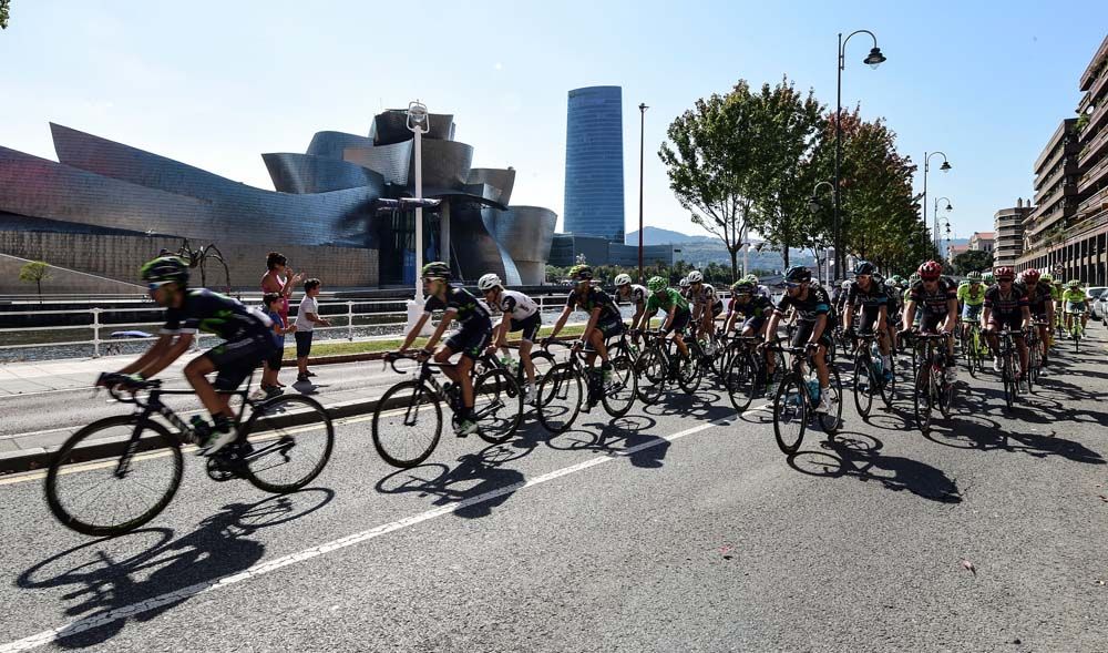 The riders pass through the neutral section