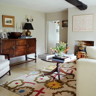 white living space with carpet and cupboard