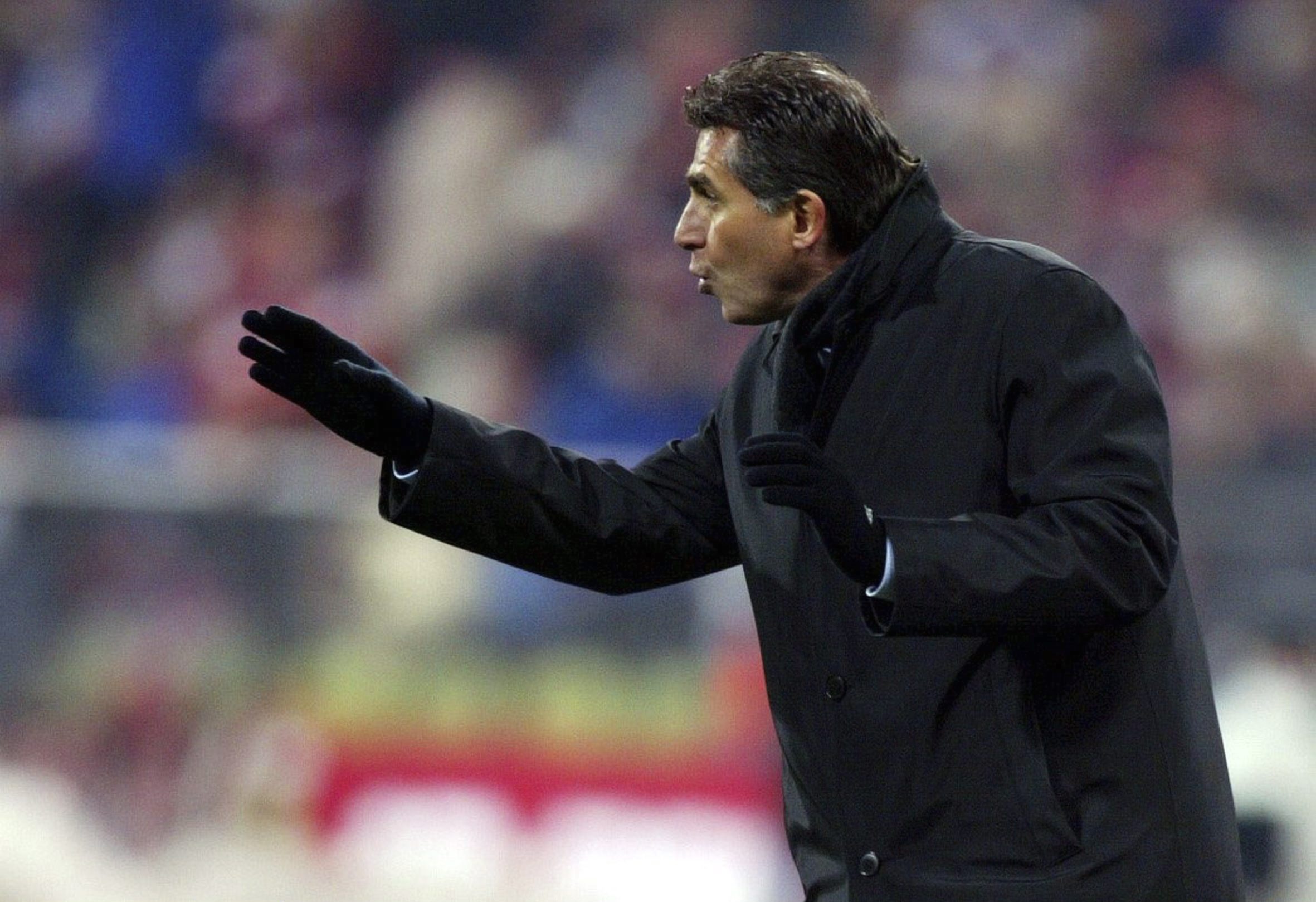 Real Madrid coach Carlos Queiroz gives instructions during a Champions League game against Bayern Munich in February 2004.