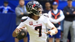 C.J. Stroud #7 of the Houston Texans throws a pass ahead of the