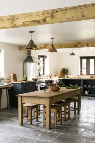 Country style shaker kitchen with floor tiles