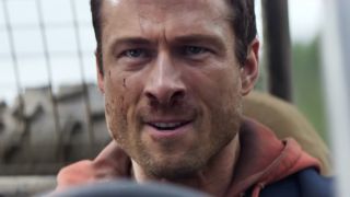 Close-up of Ben Richards with bloodied nose in The Running Man