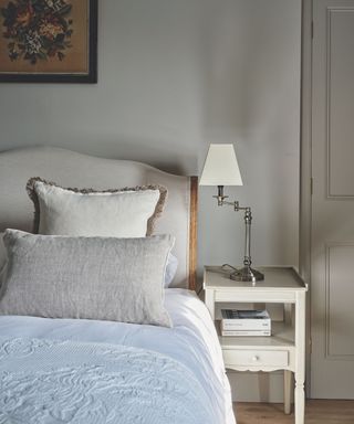 bedroom with light grey walls