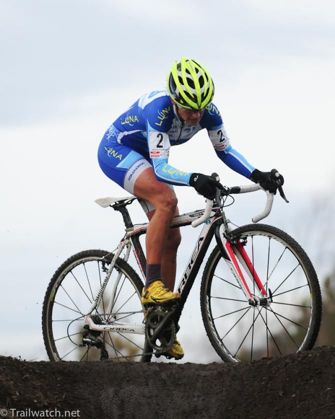 Katerina Nash (Luna Pro Team) cresting a hill with the race lead