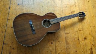Ferndale P3-E Parlor guitar on a wooden floor