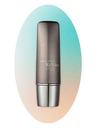 Revive sunscreen on an ombre blue and peach background