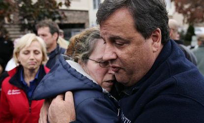 New Jersey Gov. Chris Christie comforts a victim of Superstorm Sandy on Nov. 1.