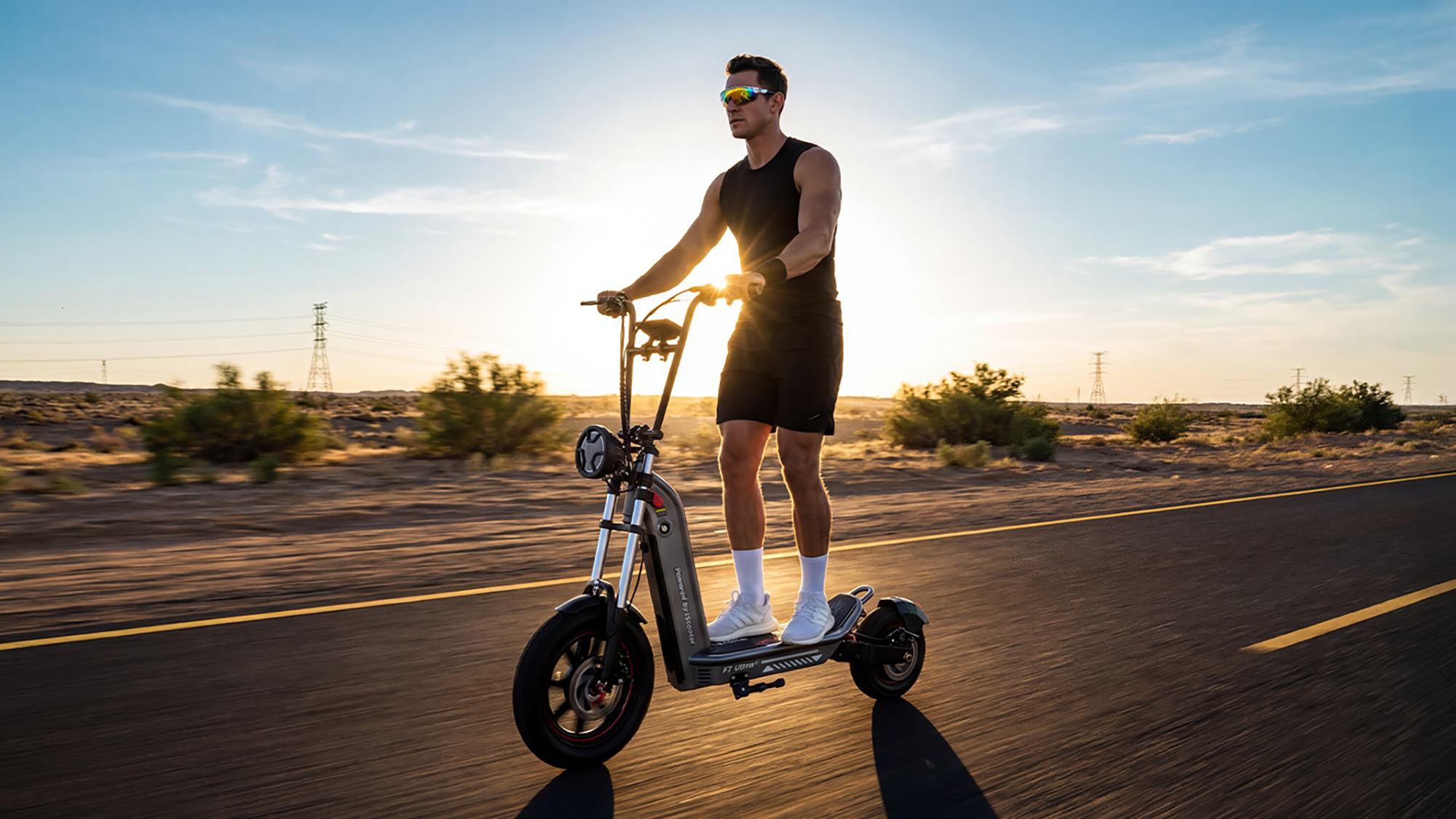 Person using scooter on road