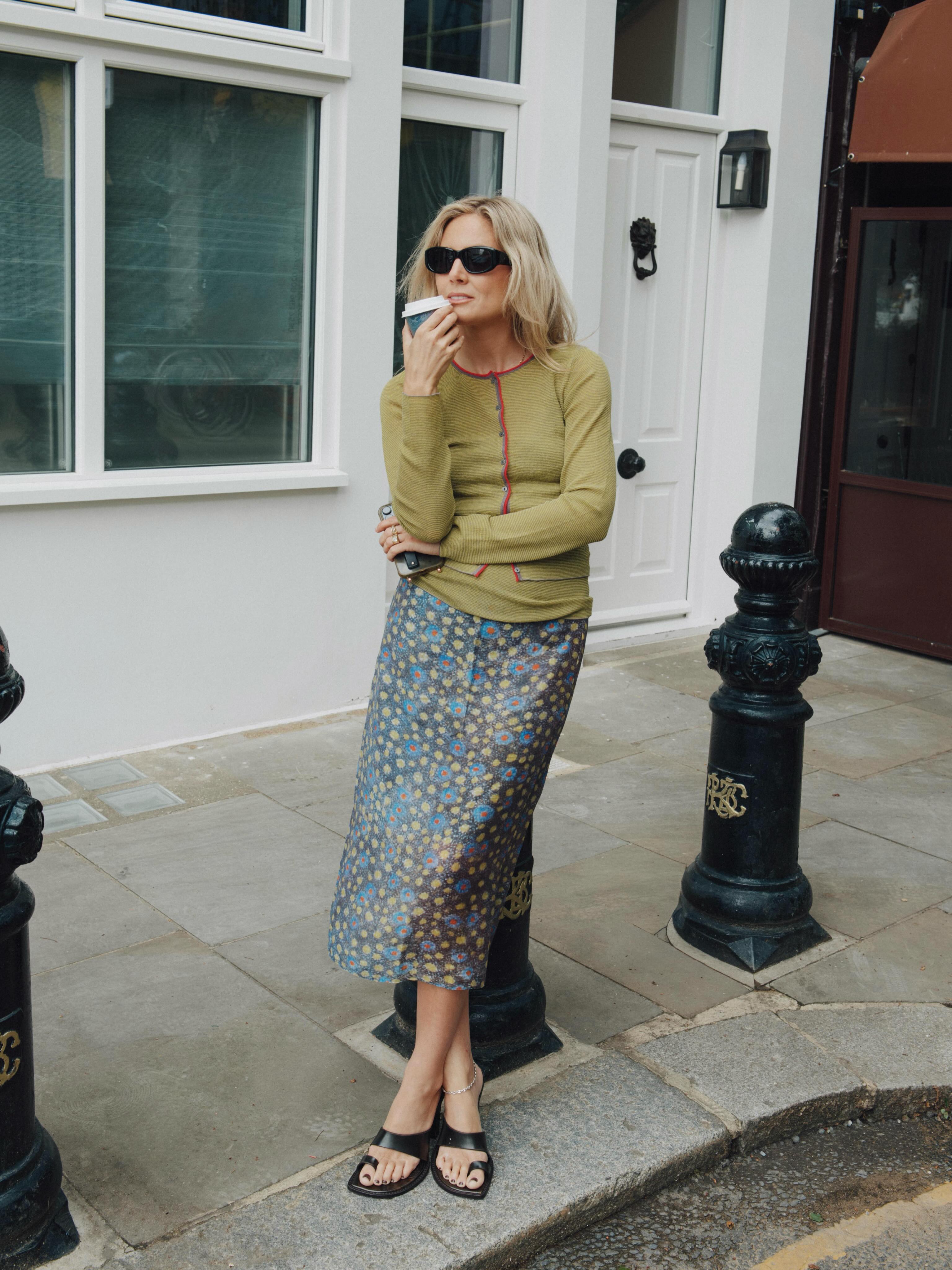 lucywilliams wears a printed skirt, sandals and top london summer capsule wardrobe