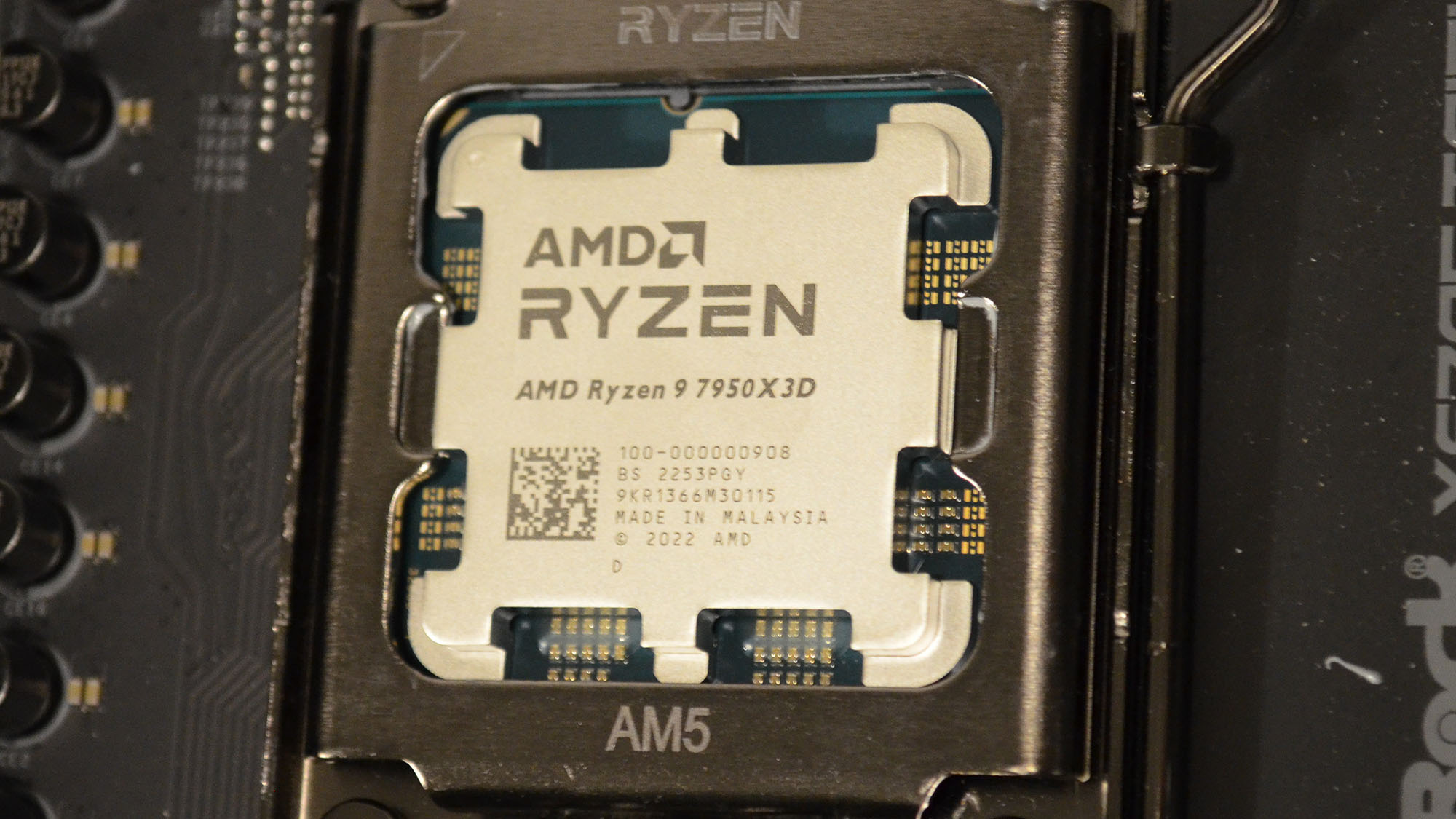 An AMD Ryzen 9 7950X3D slotted into a motherboard