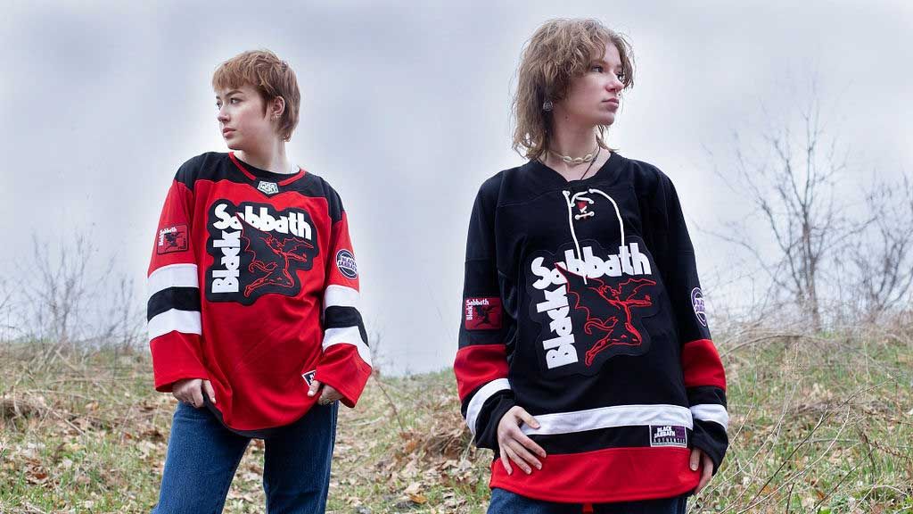 Ladies wearing Black Sabbath hockey tops