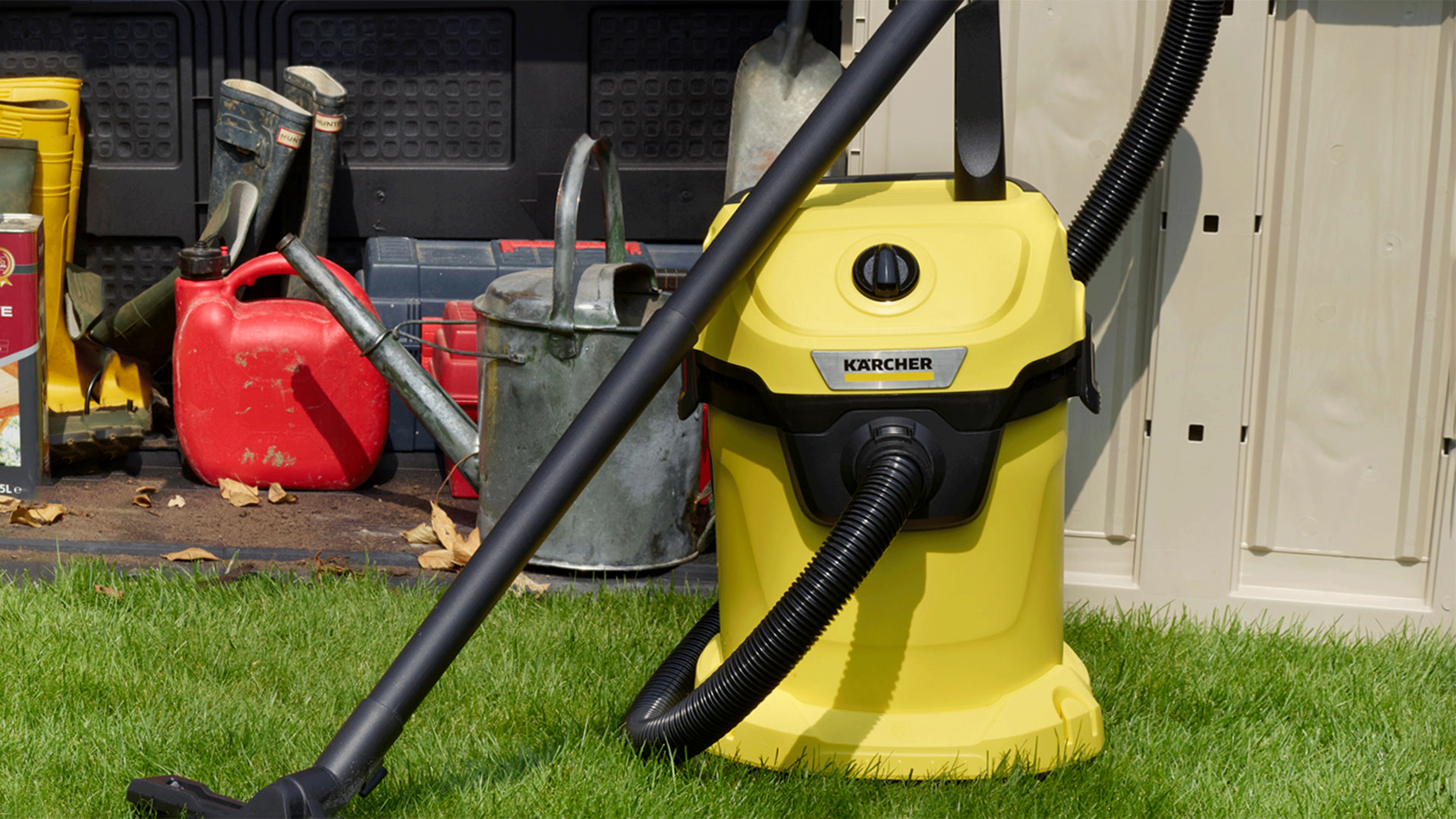 Karcher wet and dry vacuum cleaner infront of green table 