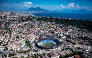 Aerial view, from a helicopter, of the city with the Diego Armando Maradona stadium and the Bay of Naples and Vesuvius in the background on September 05, 2019 in NAPLES Italy. Italy's nearly 8000 km (5,000 miles) coastlines and islands stretch across the Mediterranean Sea and attract large numbers of both local and foreign tourists during the summer season.