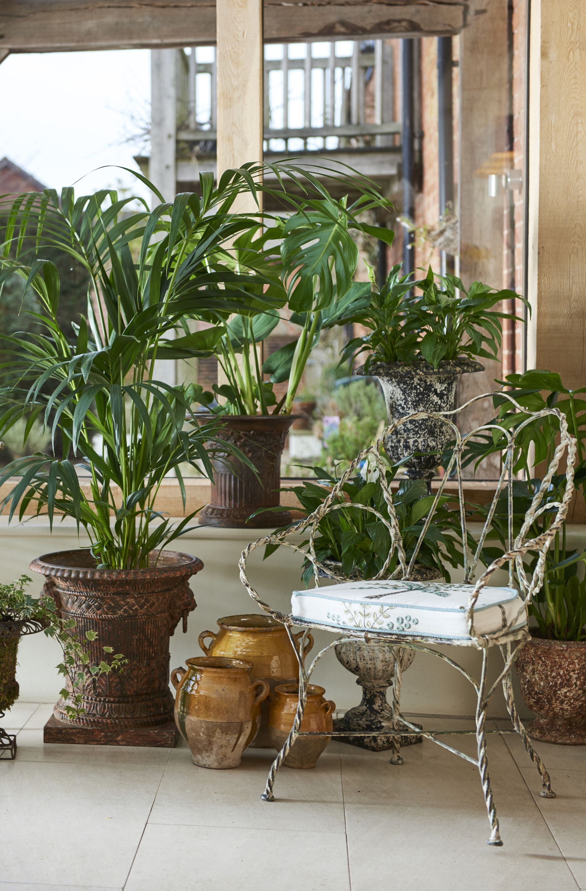 Violet Grey Directoire centrepiece urn, £1400; Confit pots (set of 3), £275