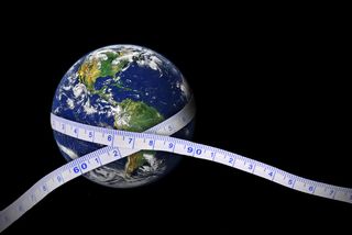 Measuring tape wrapped around the Earth (photo of Earth from NASA)
