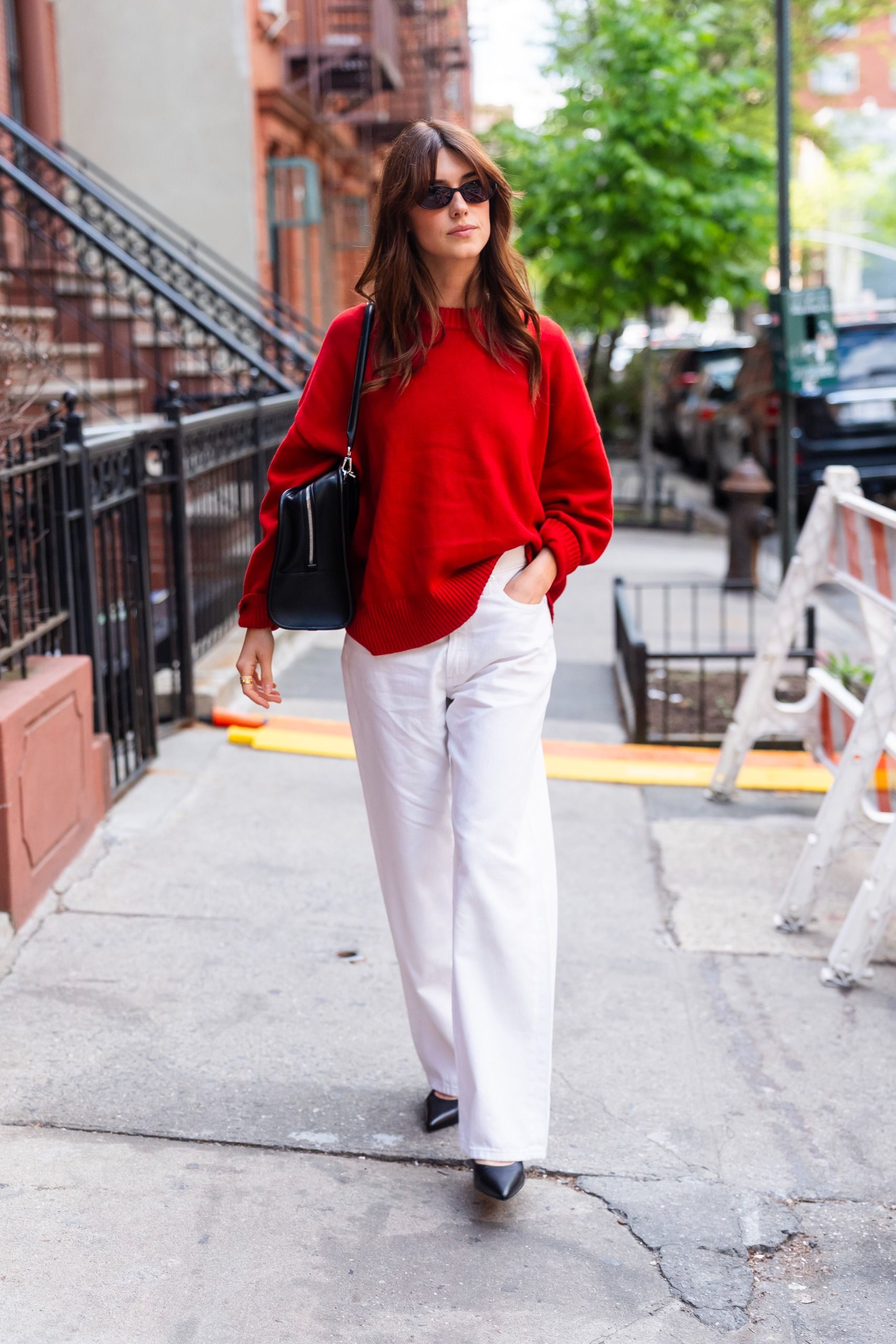 fall winter trends worn by London girls: Daisy Edgar-Jones's pop of red