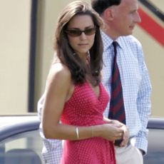 Kate Middleton wears a polka dot dress.