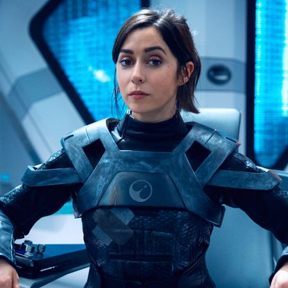 cristin millioti in a space suit sitting in a space ship in a still from black mirror