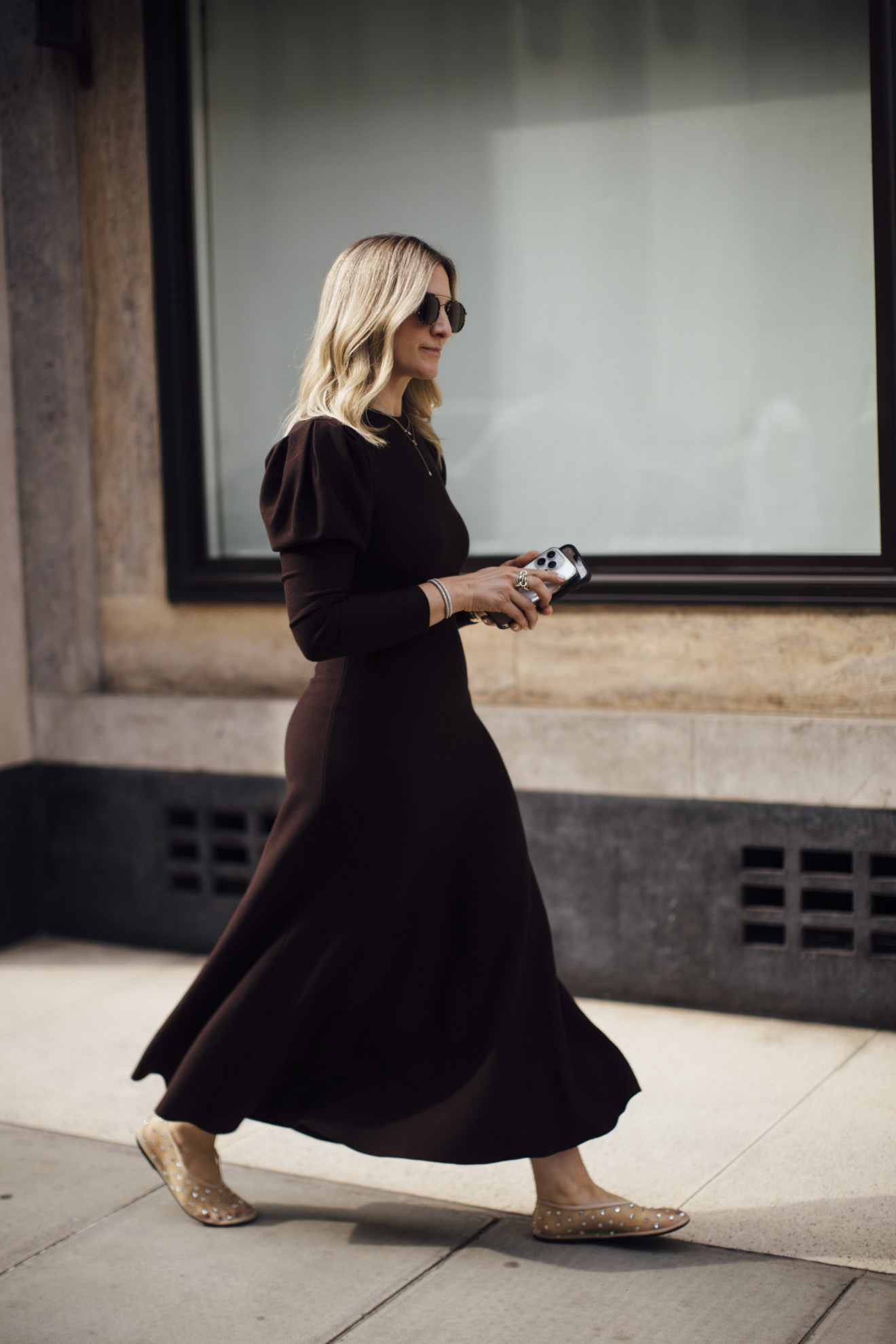 woman wearing a brown dress
