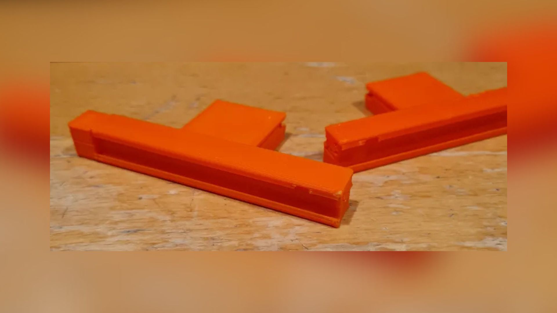 A railing for the Nintendo Joy-Con to fit into the expansion slot of a Framework computer