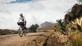 what is backpacking: bikepacker riding in the Andes