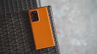 Galaxy Note 20 Ultra in Orange Leather Case on a table