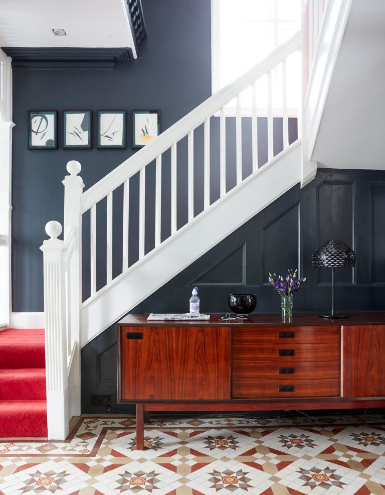 staircase with red stair runner